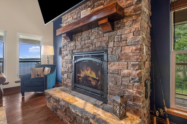388 County Road 5597, Etoile, TX 75944 - detailed view of a stone fireplace and wood finished floors