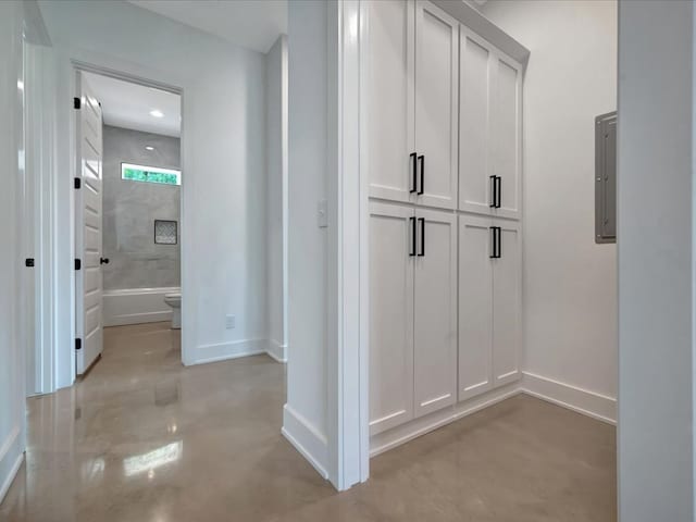 10165 US Highway 287, Corrigan, TX 75939 - hall featuring finished concrete floors and electric panel