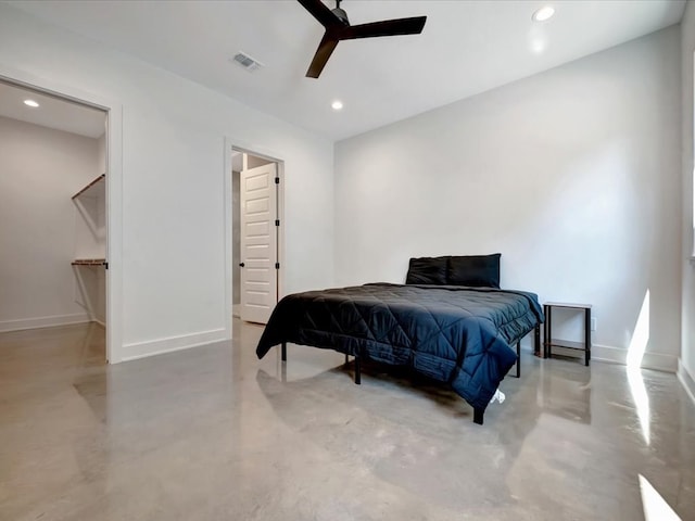 10165 US Highway 287, Corrigan, TX 75939 - bedroom with concrete floors, recessed lighting, and ceiling fan