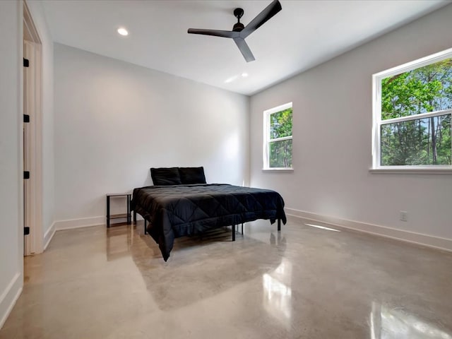 10165 US Highway 287, Corrigan, TX 75939 - bedroom featuring concrete flooring, recessed lighting, and a ceiling fan