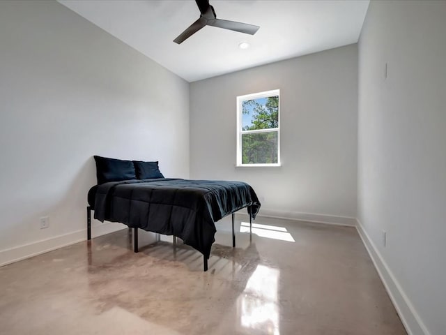 10165 US Highway 287, Corrigan, TX 75939 - bedroom featuring concrete floors, ceiling fan, and recessed lighting