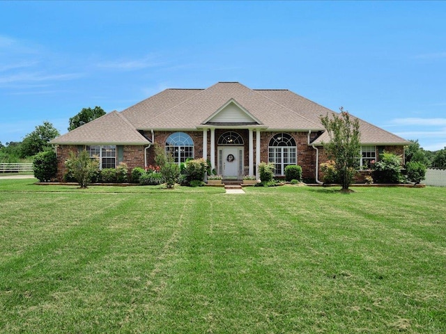325 Evans Gann Rd, Lufkin, TX 75904 - neoclassical home featuring brick siding and roof with shingles