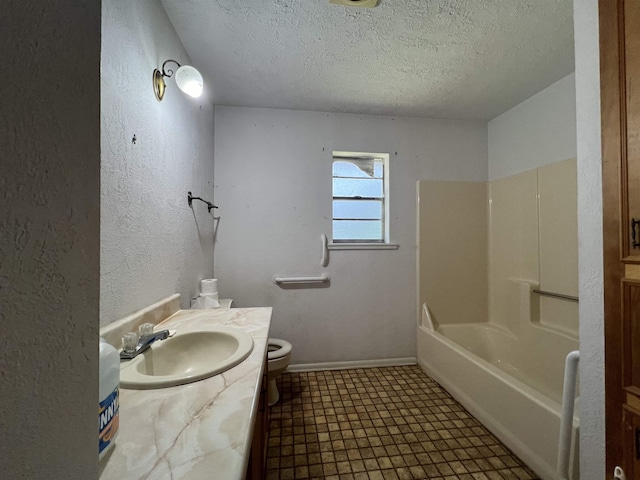 full bathroom featuring vanity,  shower combination, tile patterned floors, toilet, and a textured ceiling