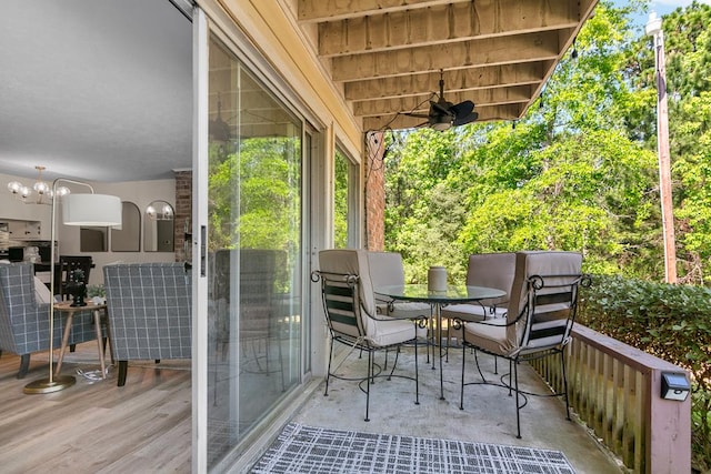 balcony featuring ceiling fan