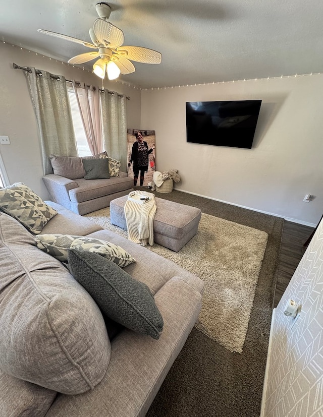 living area with ceiling fan