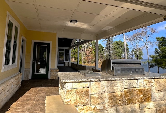 view of patio / terrace featuring an outdoor kitchen and grilling area