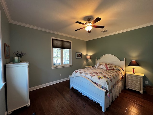 bedroom featuring ornamental molding, ceiling fan, and dark hardwood / wood-style flooring