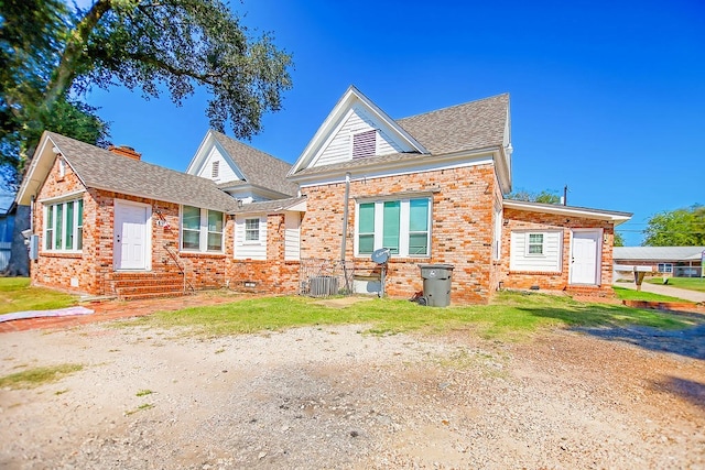 view of front of home with cooling unit