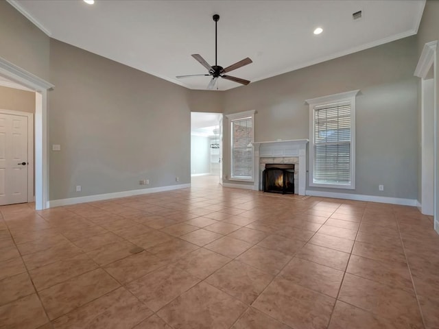 unfurnished living room with light tile patterned floors, ceiling fan, and ornamental molding