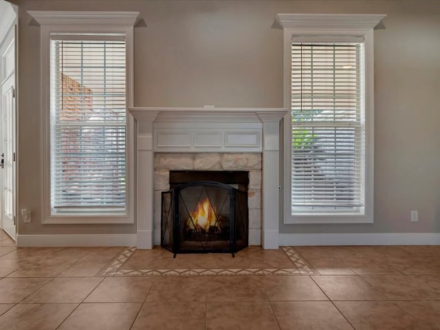 room details featuring a tiled fireplace