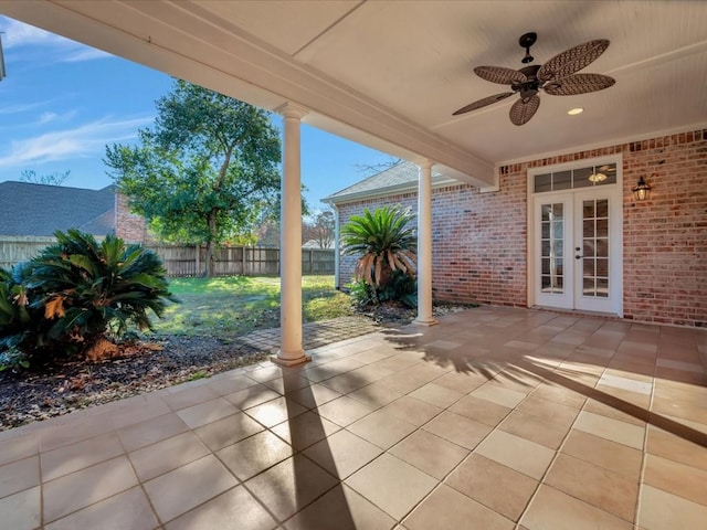 view of patio / terrace featuring ceiling fan and french doors