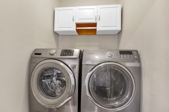 346 Northview Dr, Brookeland, TX 75931 - washroom featuring cabinet space and washing machine and dryer