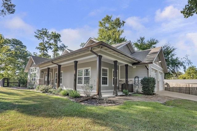 346 Northview Dr, Brookeland, TX 75931 - view of home's exterior featuring a porch, concrete driveway, an attached garage, and a shingled roof