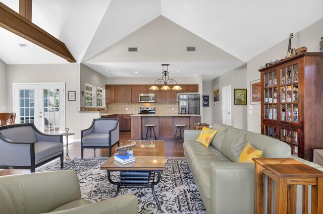 346 Northview Dr, Brookeland, TX 75931 - living room featuring wood finished floors, recessed lighting, and high vaulted ceiling