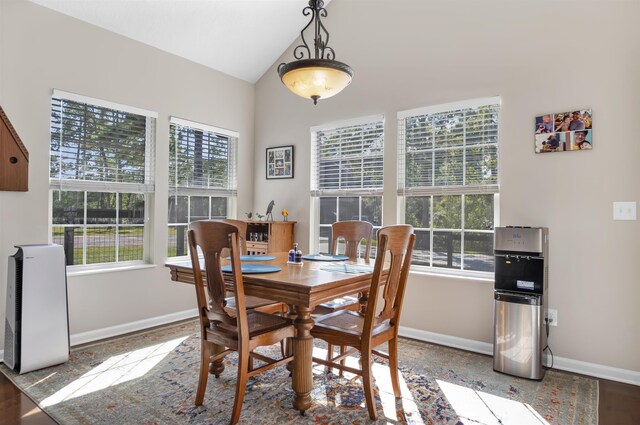 346 Northview Dr, Brookeland, TX 75931 - dining area with baseboards and vaulted ceiling
