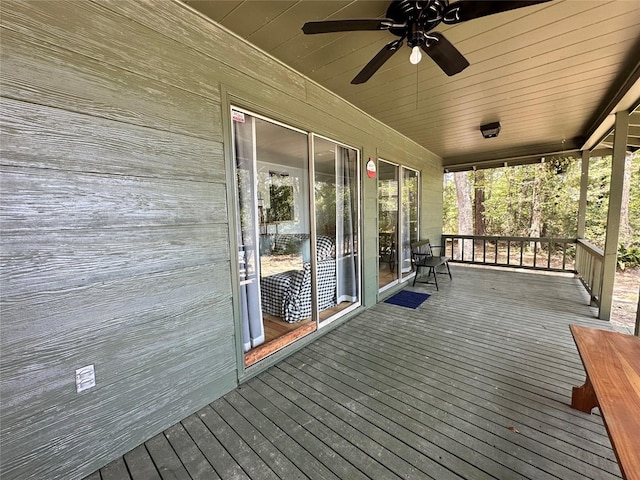 wooden terrace featuring ceiling fan