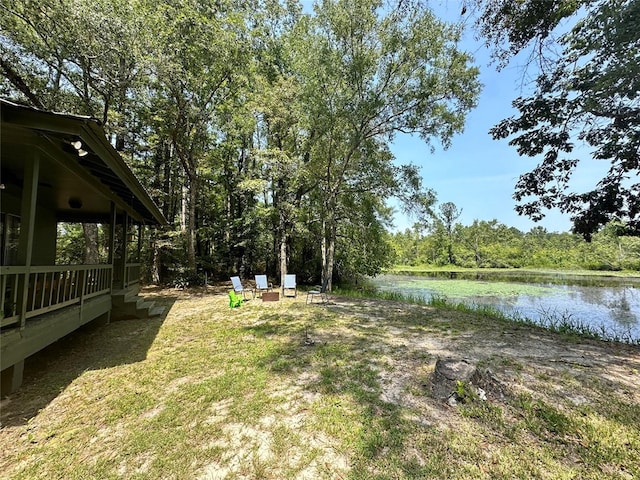 view of yard with a water view