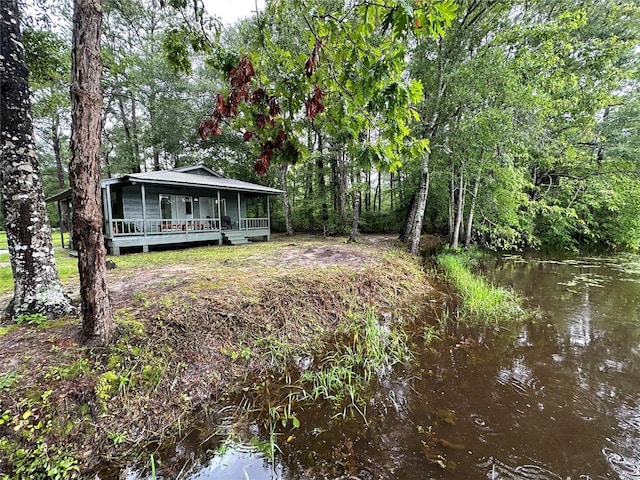 view of yard with a water view