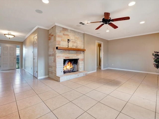 unfurnished living room featuring ceiling fan, a fireplace, light tile patterned floors, and ornamental molding