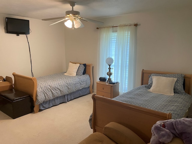 bedroom with carpet flooring and ceiling fan