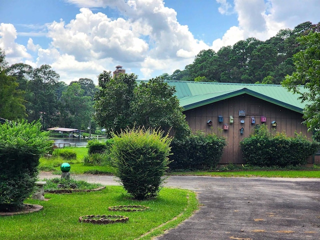 view of home's exterior featuring a yard