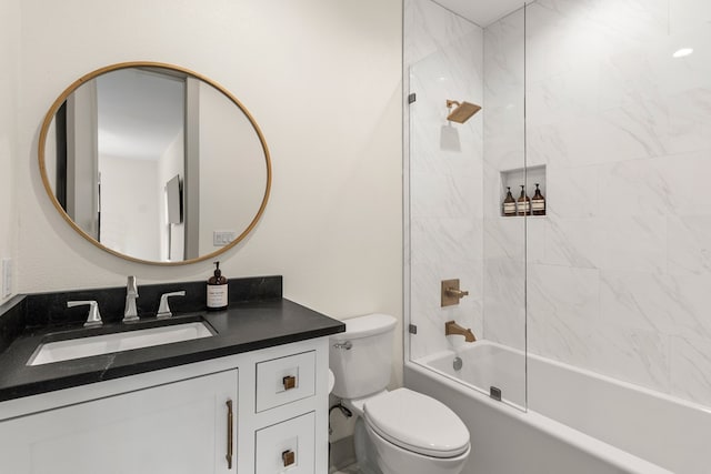 full bathroom featuring vanity, toilet, and shower / washtub combination