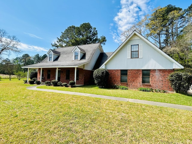 4928 Fm 252, Jasper, TX 75951 - view of front of property featuring brick siding, a front lawn, and a porch