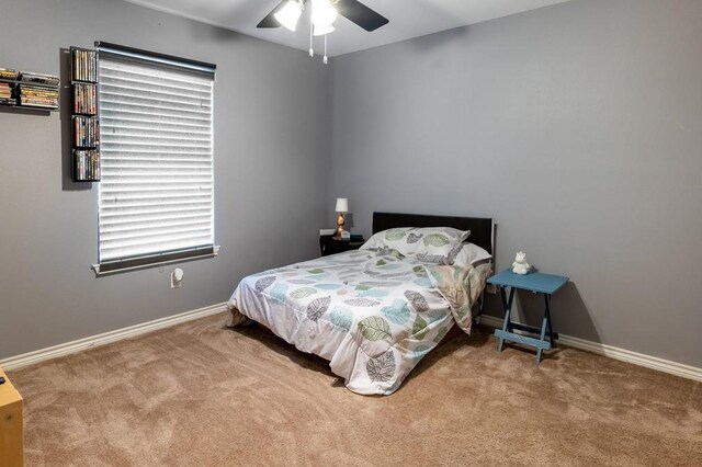 220 Casey Rd, Lufkin, TX 75901 - bedroom with carpet and a ceiling fan
