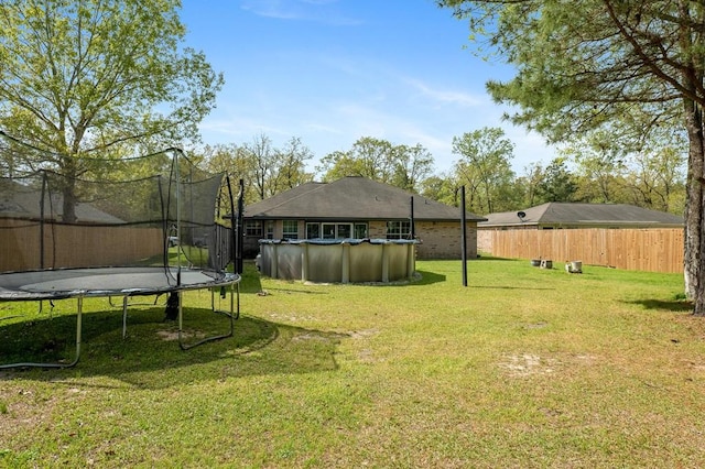 220 Casey Rd, Lufkin, TX 75901 - view of yard with a trampoline