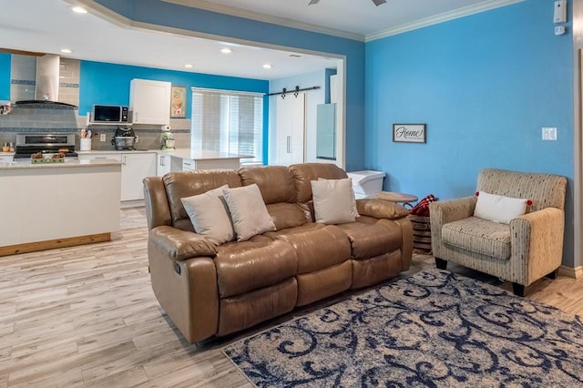 220 Casey Rd, Lufkin, TX 75901 - living area featuring ornamental molding, light wood-style floors, a ceiling fan, and recessed lighting