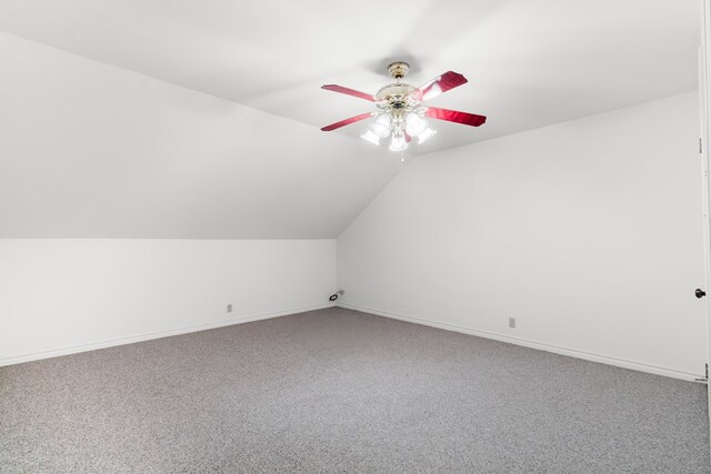 bonus room featuring ceiling fan, carpet floors, and lofted ceiling