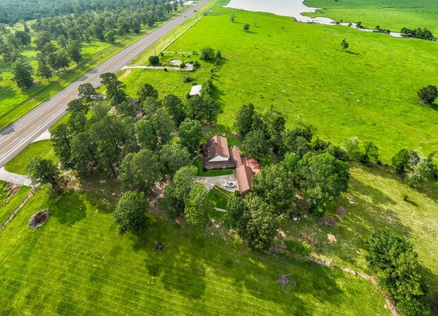 birds eye view of property featuring a rural view