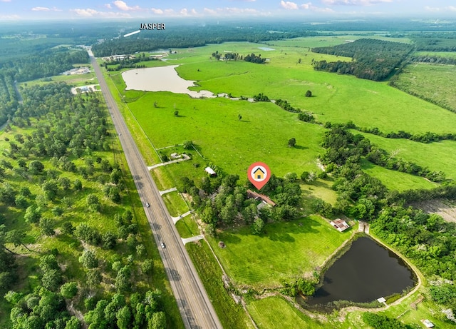 bird's eye view featuring a rural view and a water view