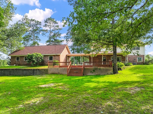 view of yard with a wooden deck