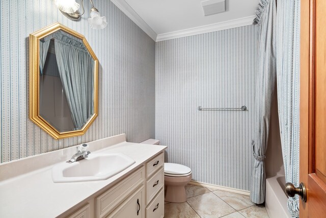 full bathroom featuring shower / bath combination with curtain, tile patterned floors, ornamental molding, vanity, and toilet