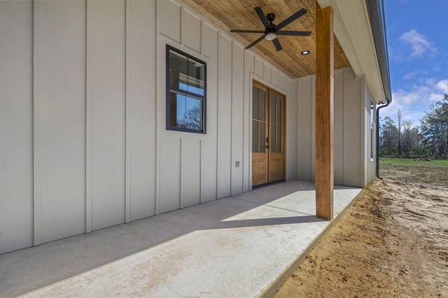 exterior space with ceiling fan