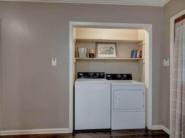 2600 Dogwood St, Nacogdoches, TX 75965 - laundry area with washer and clothes dryer and dark wood-style flooring