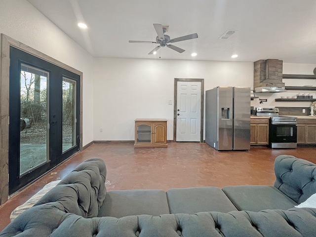 living room featuring concrete flooring and ceiling fan