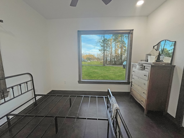 bedroom featuring dark wood-type flooring and ceiling fan