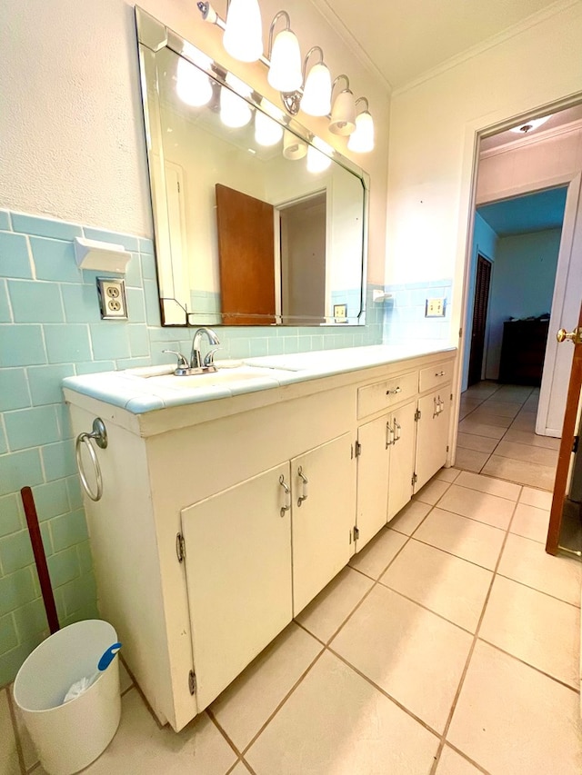7203 Fm 326, Lufkin, TX 75901 - bathroom with vanity, crown molding, tile patterned flooring, tile walls, and a wainscoted wall