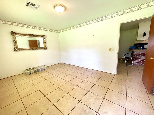 7203 Fm 326, Lufkin, TX 75901 - unfurnished room with light tile patterned flooring and baseboards
