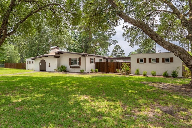 1402 Robinwood, Lufkin, TX 75904 - ranch-style home featuring a chimney and stucco siding