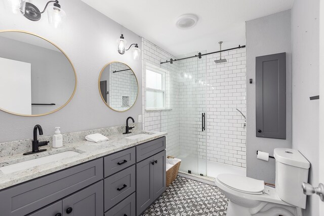 1402 Robinwood, Lufkin, TX 75904 - bathroom with toilet, a shower stall, double vanity, and electric panel
