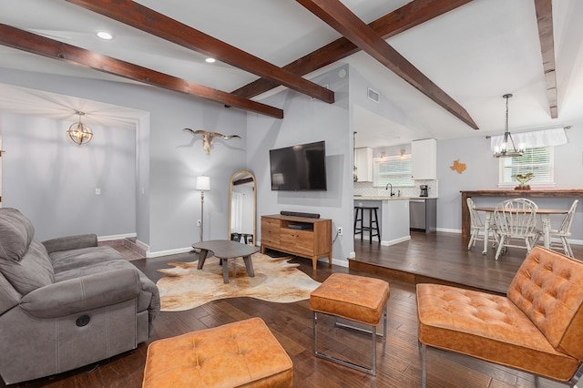 1402 Robinwood, Lufkin, TX 75904 - living area featuring a chandelier, beam ceiling, baseboards, recessed lighting, and dark wood-type flooring