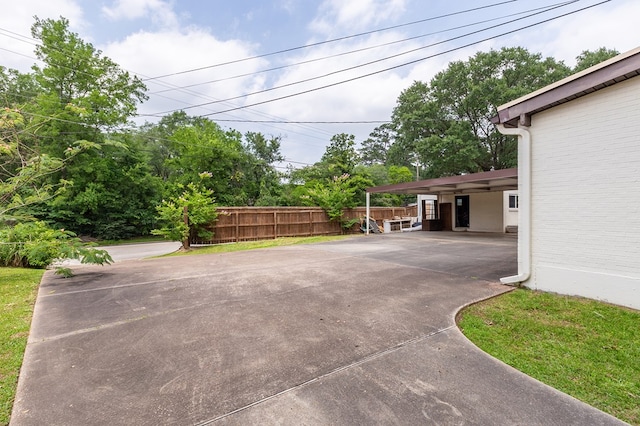 1402 Robinwood, Lufkin, TX 75904 - view of patio / terrace with concrete driveway and a carport