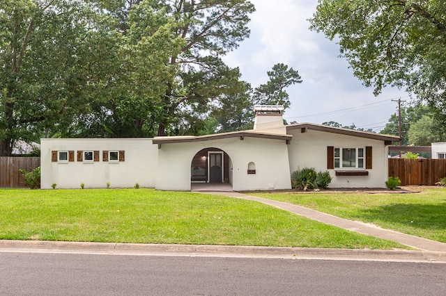 1402 Robinwood, Lufkin, TX 75904 - view of front of house featuring a chimney
