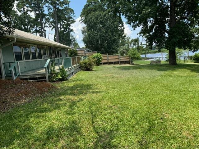 view of yard featuring a wooden deck