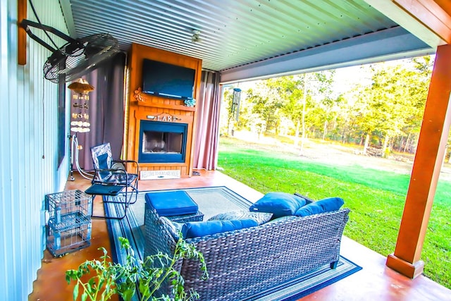 view of patio featuring a fireplace