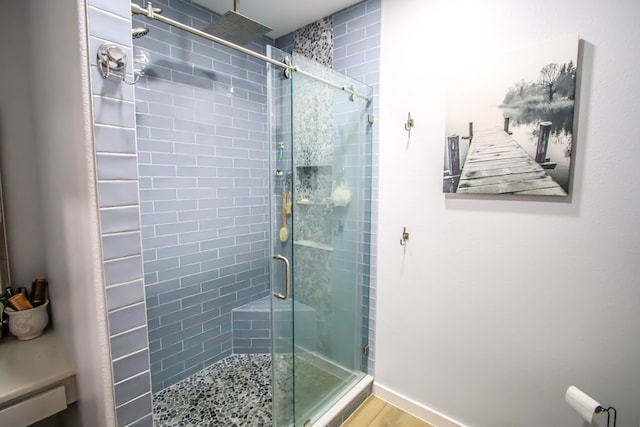 bathroom with an enclosed shower