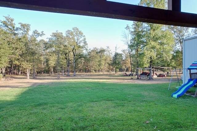 view of yard with a playground
